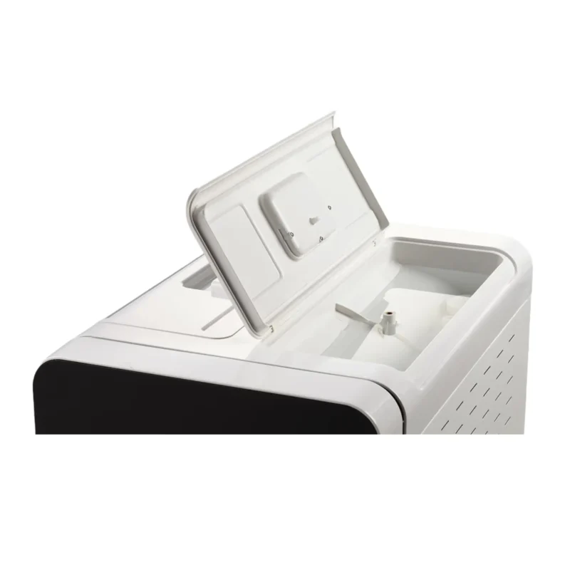 Autoclave_Touch_Pro_23L_708228_5_web_701d - LabDidakt.dk Et nærbillede af en åben Autoklave VAPOURLINE lite 23 L, hvor det hvide låg og de indvendige rum kan ses.