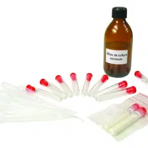 En brun flaske mærket "Mikrobiologisk initieringssæt - Yoghurtbakterier", reagensglas med låg, pipetter og en lille pose med rør.