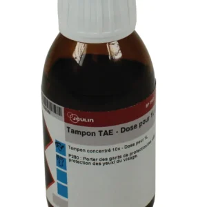 En brun glasflaske med en hvid hætte mærket TAE-buffer - Dosis til 1L og sikkerhedsinstruktioner på fransk.