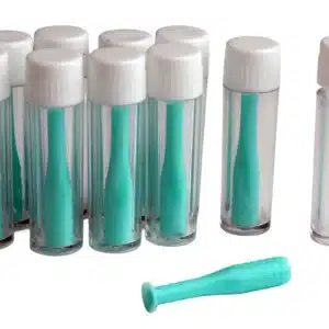 Et sæt på ti "Sugekop til dækglas" med klare ampuller, hvide hætter, blågrønne pinde indeni; en ampul og en pind er adskilt foran.
