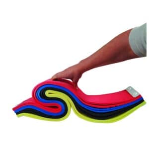 Hand gripping a stack of colorful elastic resistance bands arranged in a wavy curl, in pink, red, blue, black, and yellow colors.